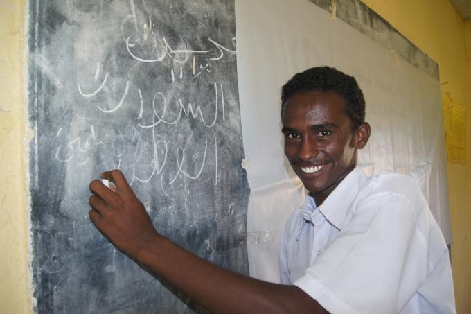 Mohamed, 16 years old, in his new constructed classroom, Blue Nile State - Sudan. Photo Dina Taha
